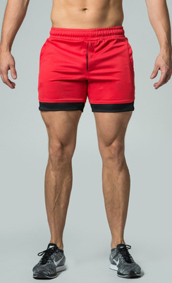 Comercio al por mayor de fábrica Deportes Ocio Wicking Baloncesto Correr al aire libre Malla de playa Pantalones cortos deportivos transpirables Hombres